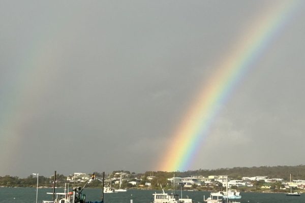 Beautiful rainbow symbolizing love and joy in spiritual teachings.
