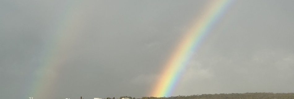 Beautiful rainbow symbolizing love and joy in spiritual teachings.